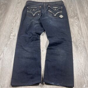 Affliction Baggy jeans with a patches on front and back pockets 

40 x 30